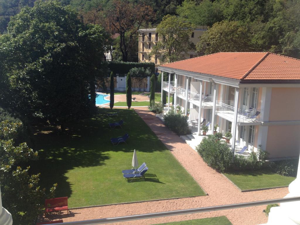 Residence Ville Lago Lugano Porto Ceresio Bagian luar foto