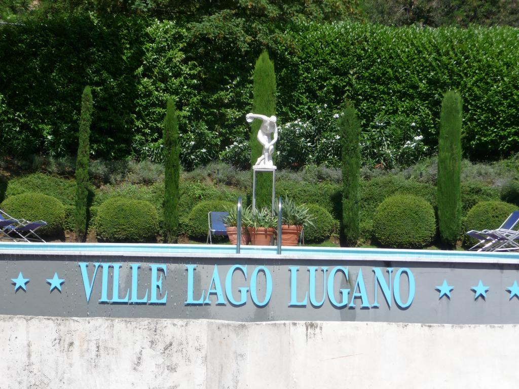 Residence Ville Lago Lugano Porto Ceresio Bagian luar foto