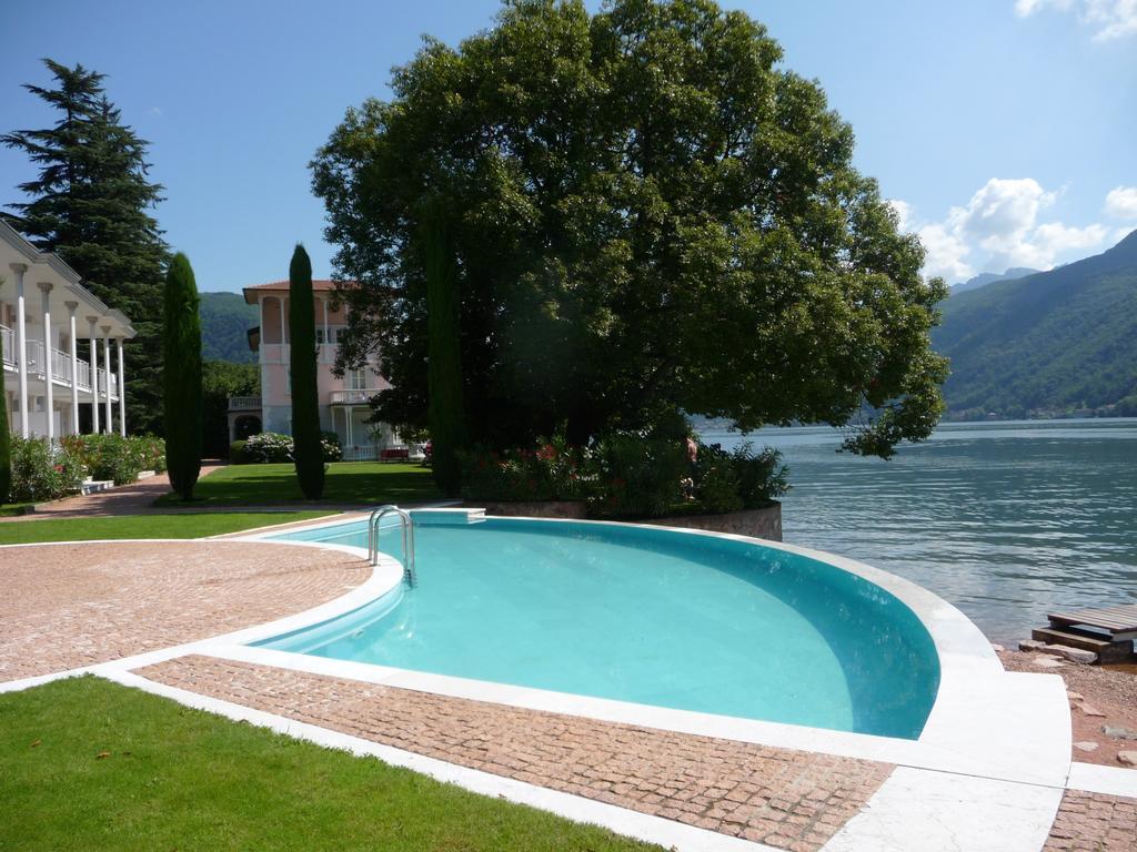 Residence Ville Lago Lugano Porto Ceresio Bagian luar foto
