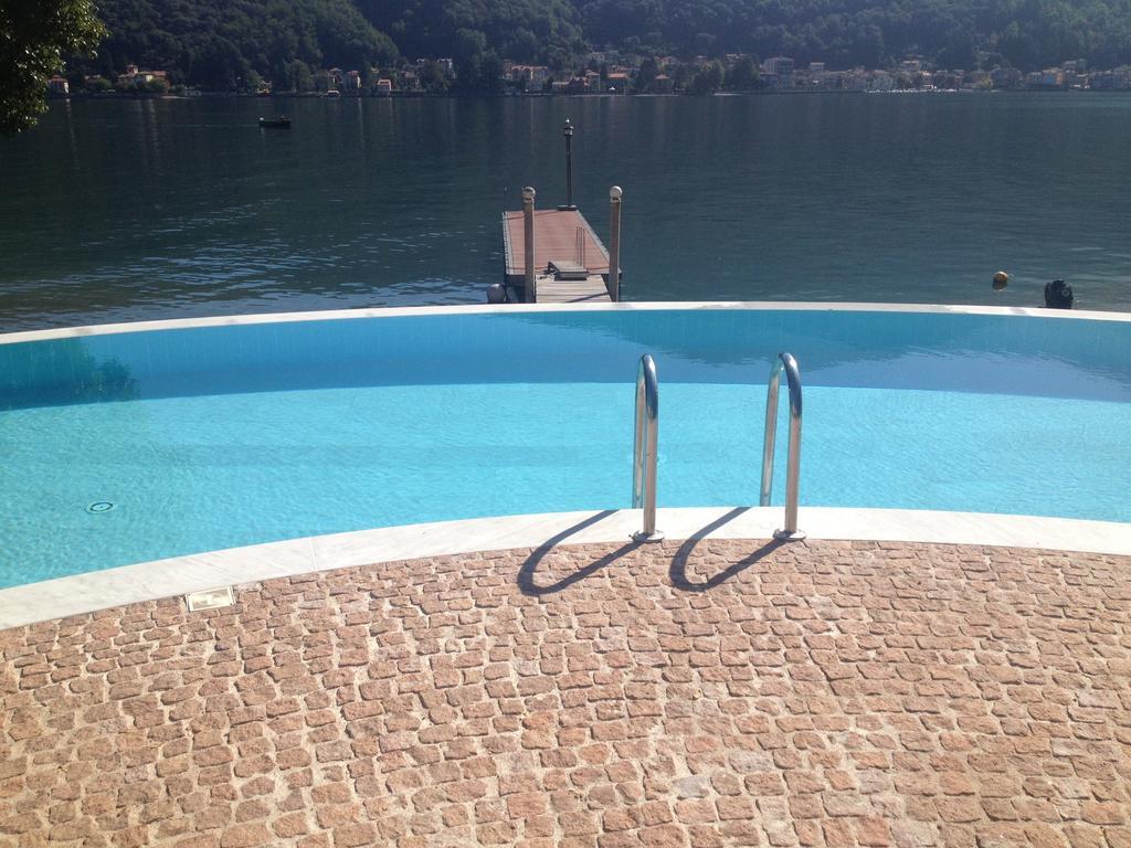 Residence Ville Lago Lugano Porto Ceresio Bagian luar foto