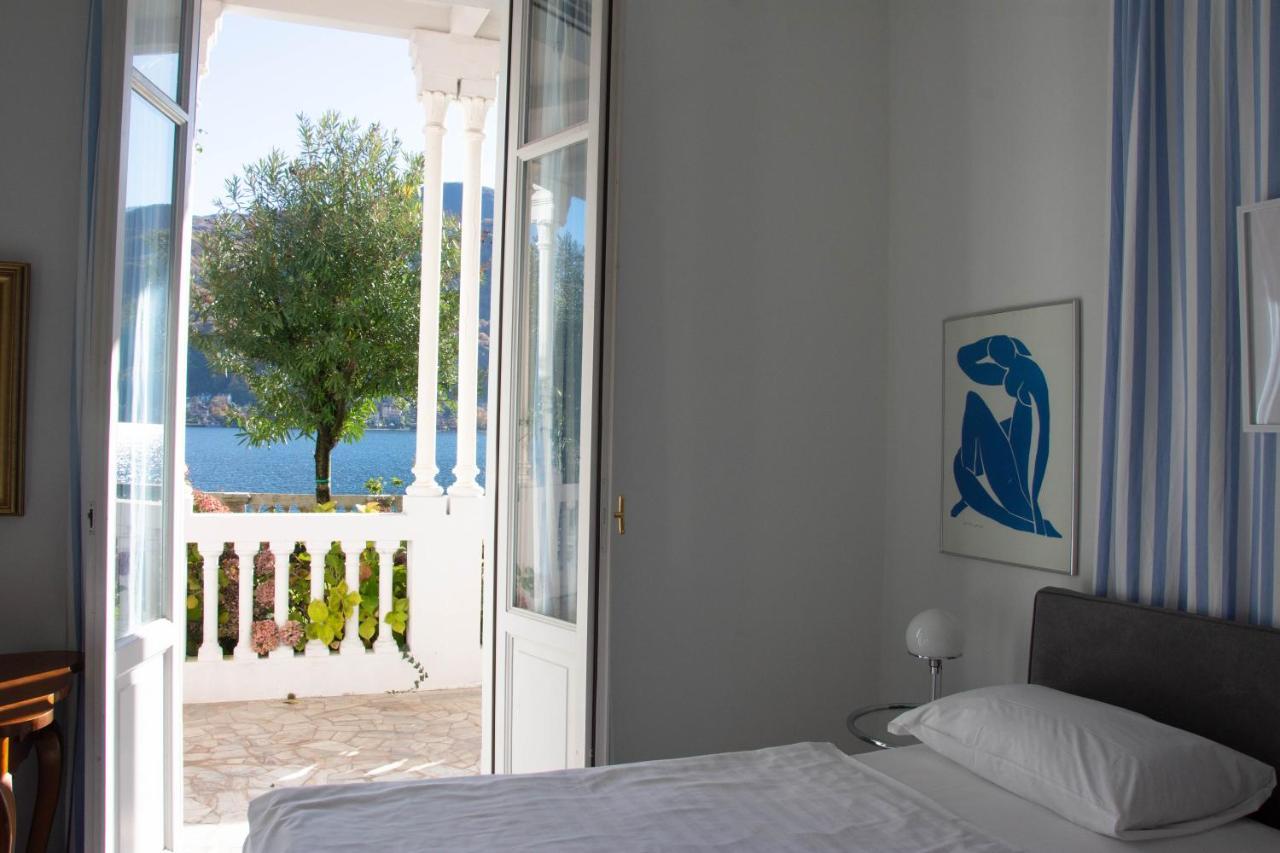 Residence Ville Lago Lugano Porto Ceresio Bagian luar foto