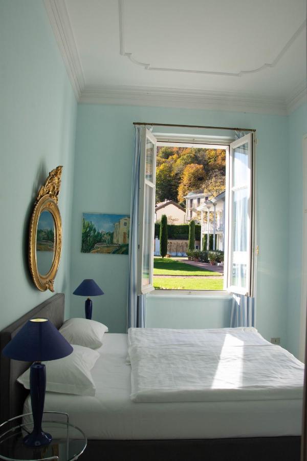 Residence Ville Lago Lugano Porto Ceresio Bagian luar foto