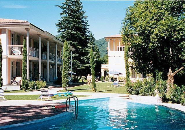 Residence Ville Lago Lugano Porto Ceresio Bagian luar foto