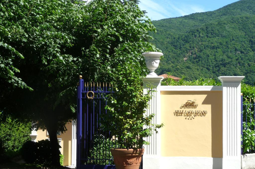 Residence Ville Lago Lugano Porto Ceresio Bagian luar foto